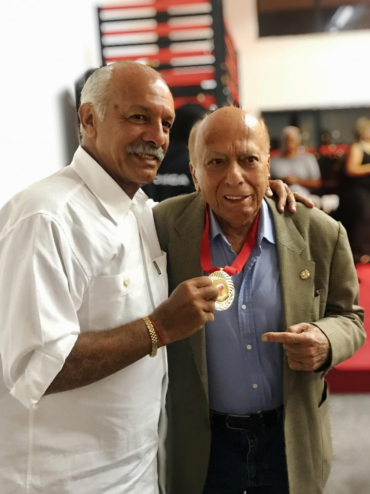 Maestro Junior e George Helal (Divulgação/ Flamengo) Maestro Junior e George Helal (Divulgação/ Flamengo)